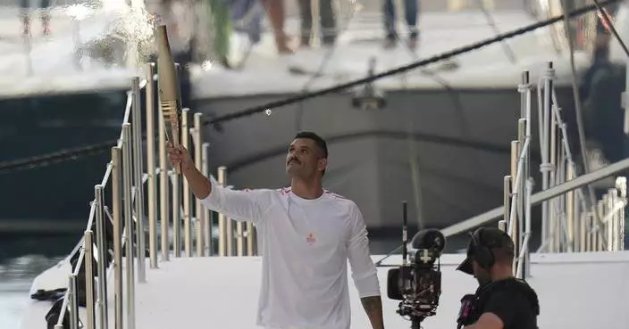 Torchbearers in Marseille kick off the Olympic flame&#8217;s journey across France