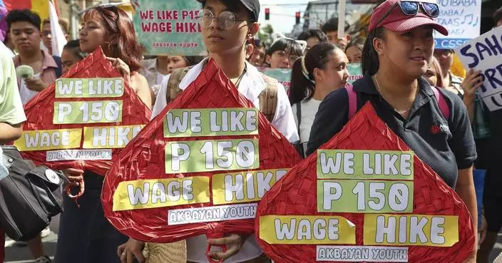 Workers and activists around the world hold May Day rallies urging greater rights and more pay