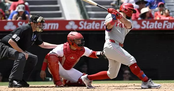 Phillies strike out 18 times, but beat Angels 2-1 on Schwarber&#8217;s 2-run single