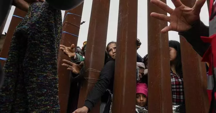 An AP photographer covers the migrant crisis at the border with sensitivity and compassion