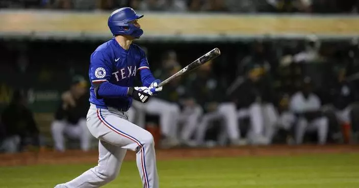 Corey Seager hits a 3-run homer in the 8th inning to rally the Rangers past the A&#8217;s 4-2