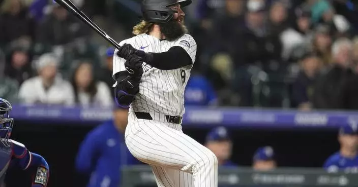 Charlie Blackmon&#8217;s 2-run double in the 8th inning leads Rockies past Rangers 4-2