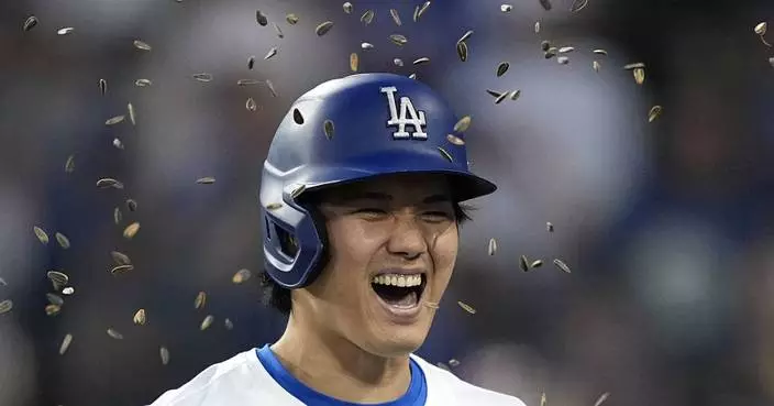 Ohtani hits 2-run homer and scores go-ahead run on his special day in LA as Dodgers beat Reds 7-3