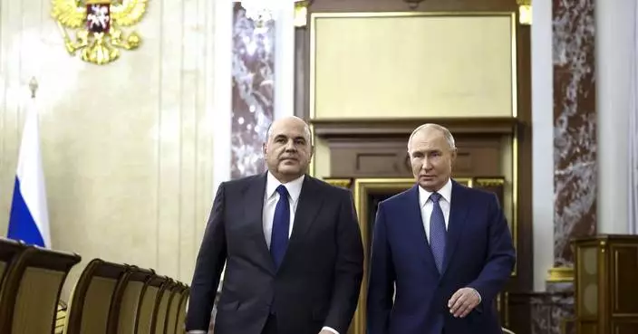 Putin reappoints his prime minister, a technocrat who has kept a low political profile