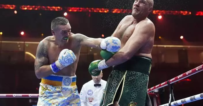 Usyk beats Fury by split decision to become the first undisputed heavyweight champion in 24 years