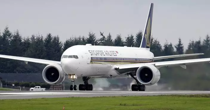 British man dies and several passengers are injured when turbulence hits a Singapore Airlines flight