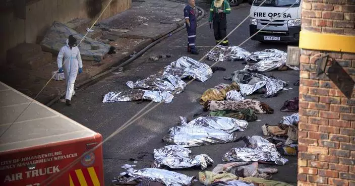 An inquiry into a building fire in South Africa that killed 76 finds city authorities responsible