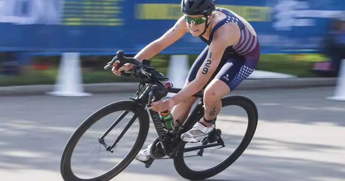 Olympic triathlete Taylor Knibb wins US cycling time trial to earn spot in Paris in a second sport