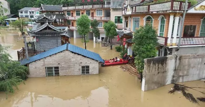 Rain-triggered floods submerge houses, cut roads, trap residents in Guizhou