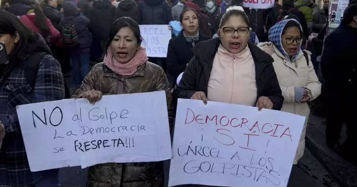 Protesters rally in Bolivia, boosting the president and denouncing the thwarted military coup