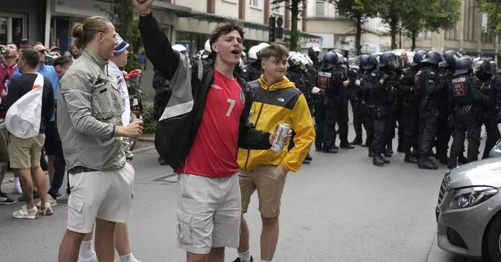 Riot police in Germany intervene to stem fan clashes before Serbia-England match at Euro 2024