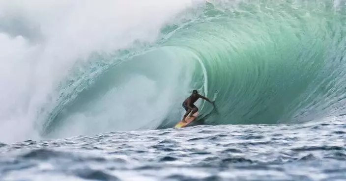 Former pro surfer known for riding huge Pipeline waves dies in shark attack while surfing off Oahu