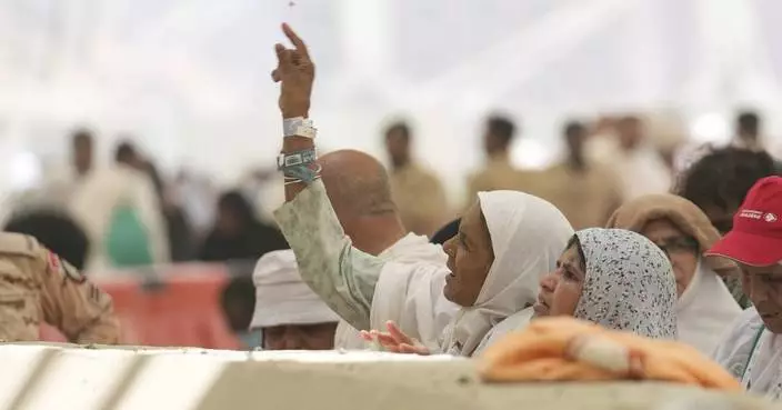 Muslim pilgrims resume symbolic stoning of the devil as they wrap up Hajj pilgrimage in deadly heat