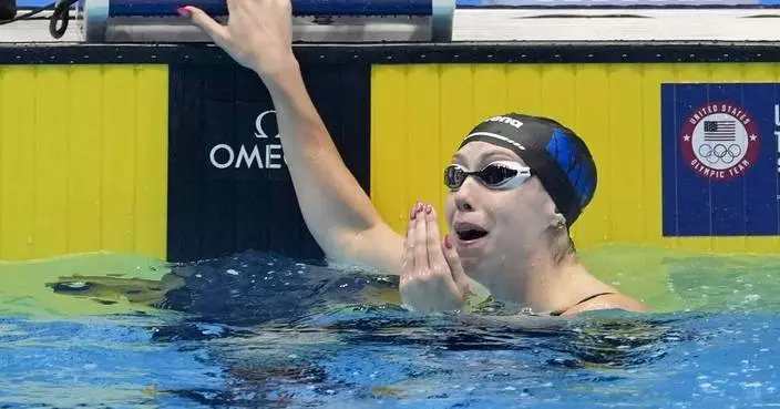 Gretchen Walsh sets a world record in the 100-meter butterfly at the U.S. Olympic trials