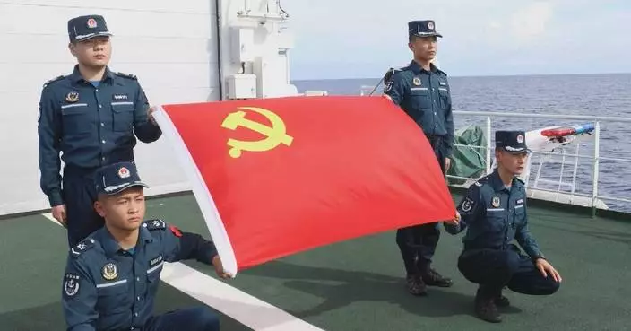 Chinese coast guard personnel celebrate founding anniversary of CPC at South China Sea