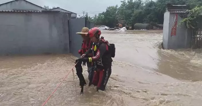 Crews conduct emergency rescues, evacuations in heavy floods