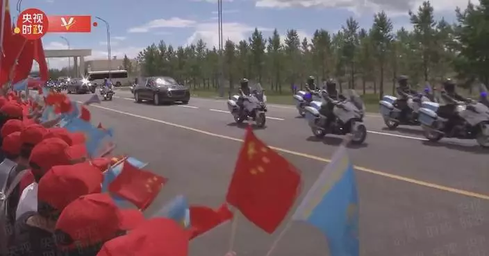 Xi receives warm welcome in Kazakhstan