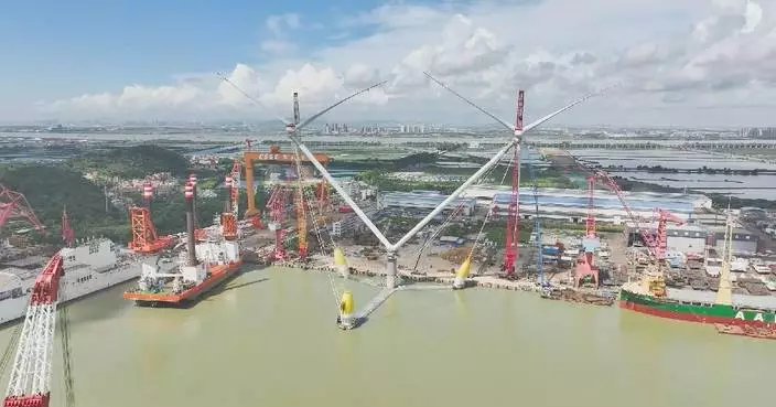 World's largest single-capacity floating wind power platform hoisted in Guangzhou