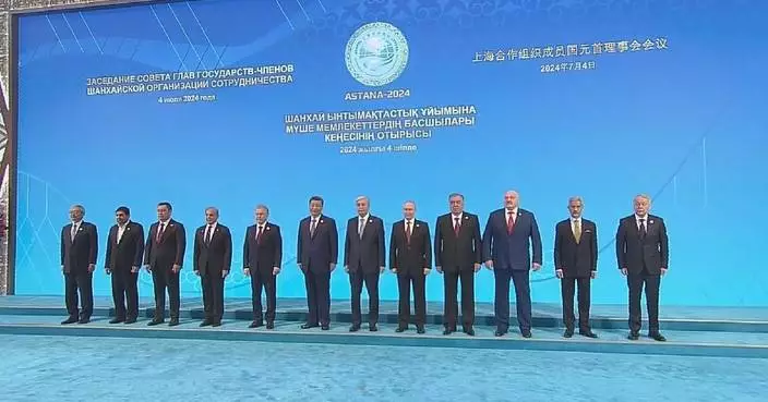 Leaders pose for group photos at SCO Astana summit