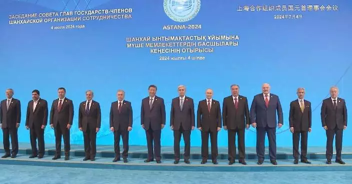 SCO leaders pose for group photos at Astana summit