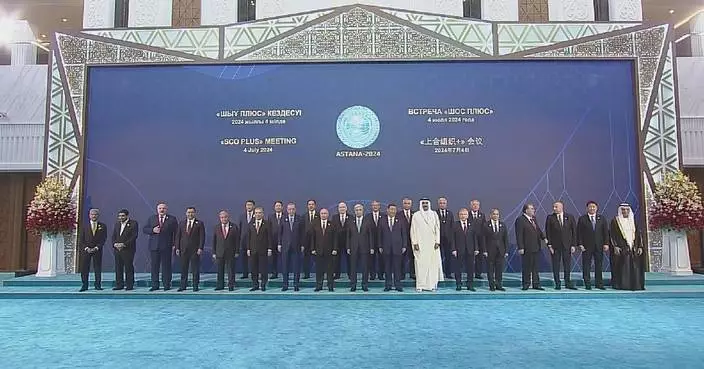 Leaders attending &#8220;SCO Plus&#8221; meeting pose for group photos