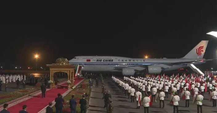 Tajik president greets Xi upon arrival for state visit
