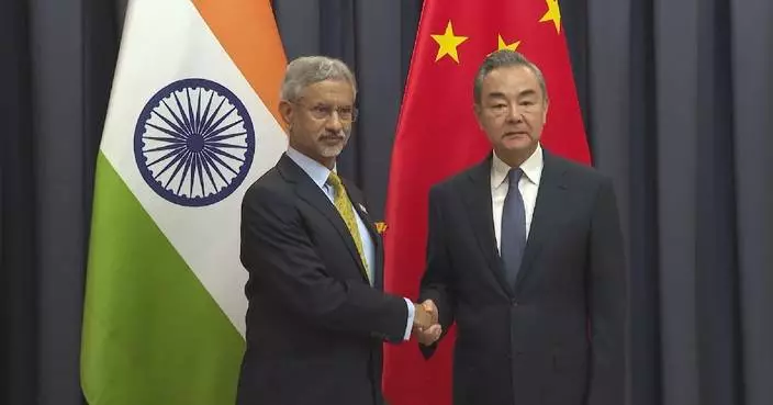 Chinese, Indian FMs meet on sidelines of SCO Summit in Astana
