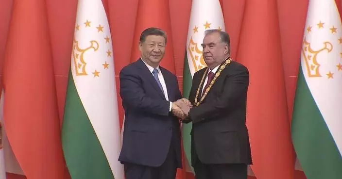 Xi awards Tajik President Rahmon with China's friendship medal