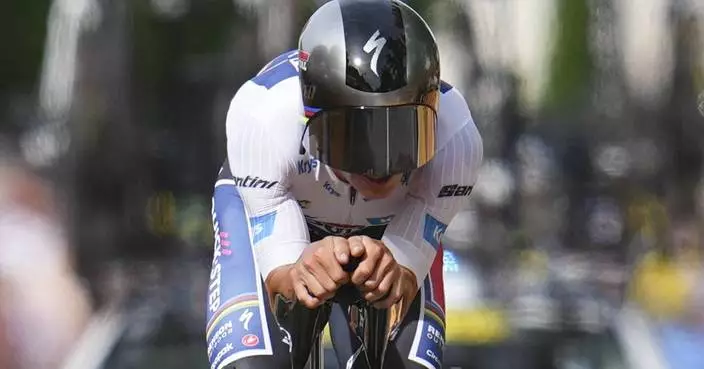 Evenepoel wins Tour de France time trial with vintage performance in Burgundy vineyards