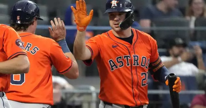 Astros move above .500 for 1st time this year, beat Mets 10-5 in 11 innings for 9th win in 10 games
