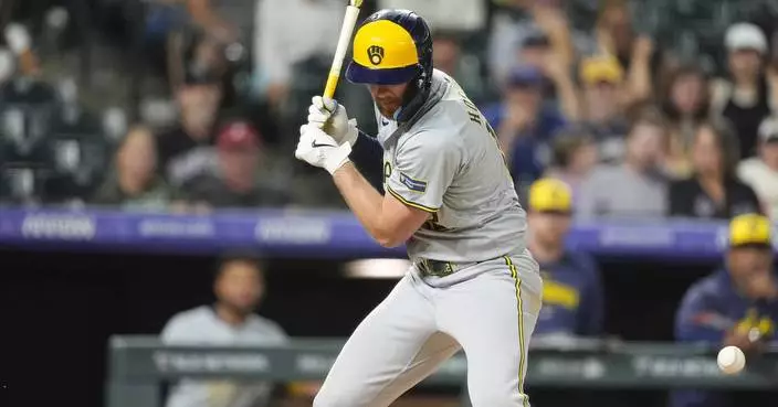 Rhys Hoskins hit by pitch with bases loaded in 9th inning, Brewers beat Rockies 4-3