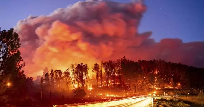 People flee Idaho town through a tunnel of fire and smoke as Western wildfires spread