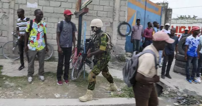 Haiti&#8217;s prime minister says Kenyan police are crucial to controlling gangs, early days are positive