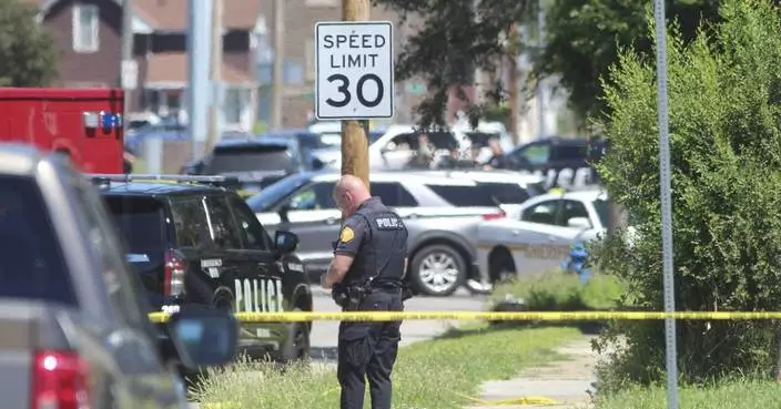 Armed bicyclist killed in Iowa shooting that wounded 2 police officers, investigators say