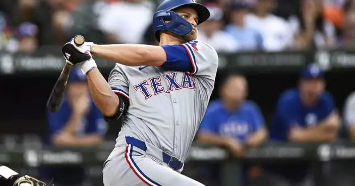 Rangers add Seager to lineup late after 2-game absence from getting hit by a pitch on the wrist