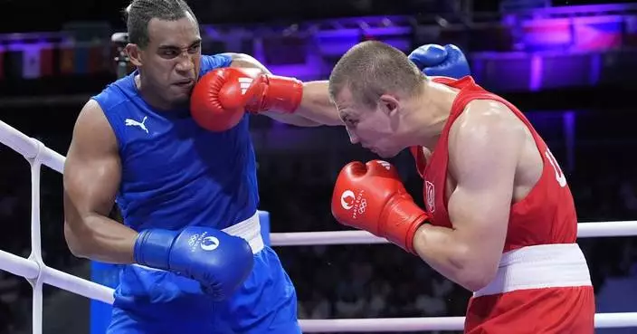 Two-time Olympic gold medalist boxer Arlen López of Cuba loses in Paris semis to Oleksandr Khyzhniak