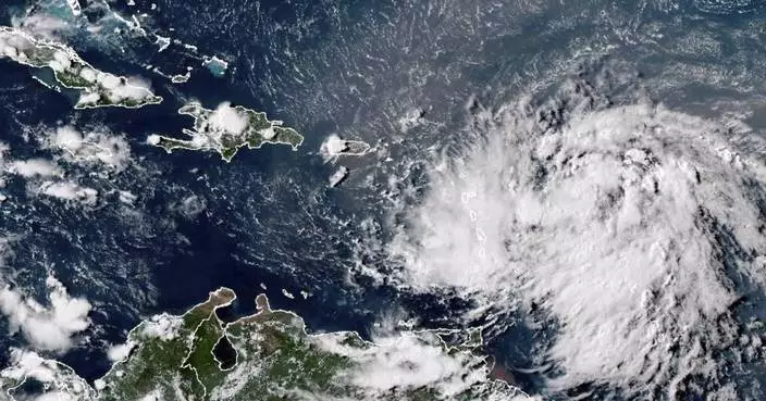 Tropical Storm Ernesto batters northeast Caribbean and aims at Puerto Rico as it strengthens