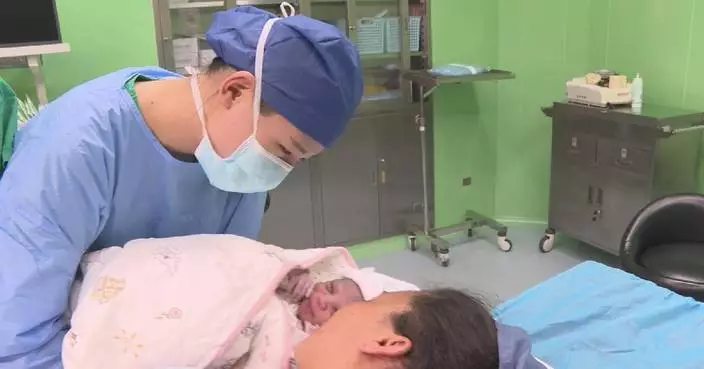 Baby delivered on China's Peace Ark hospital ship in Angola