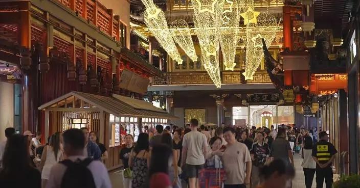 Night skies lit up by lanterns, molten iron flower fireworks to celebrate Mid-Autumn Festival