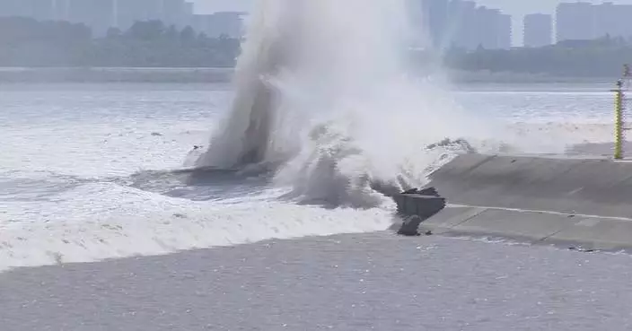 Aerial footage captures spectacular tidal bore on Qiantang River