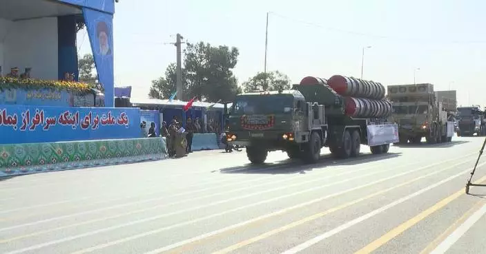 Iran unveils homegrown missile, drone at military parade marking Iran-Iraq war