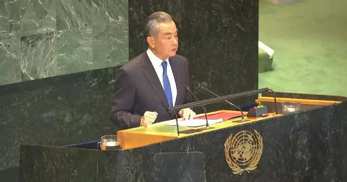 Wang Yi calls on int‘l community to strengthen unity, cooperation in building peaceful future