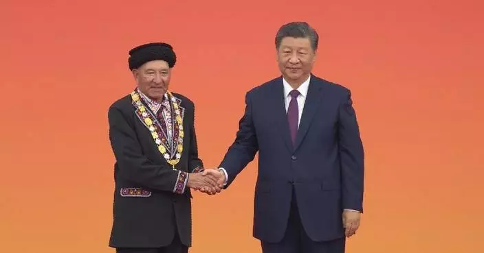 Xi confers national honorary titles on 10 recipients