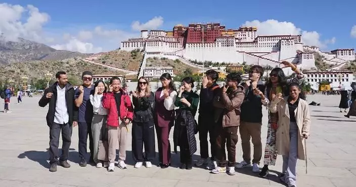 Foreign youth delegation tours Xizang to better understand China