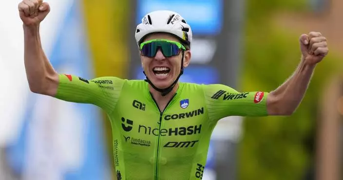 Cycling star Pogačar wins men's road race at world championships with brilliant solo attack