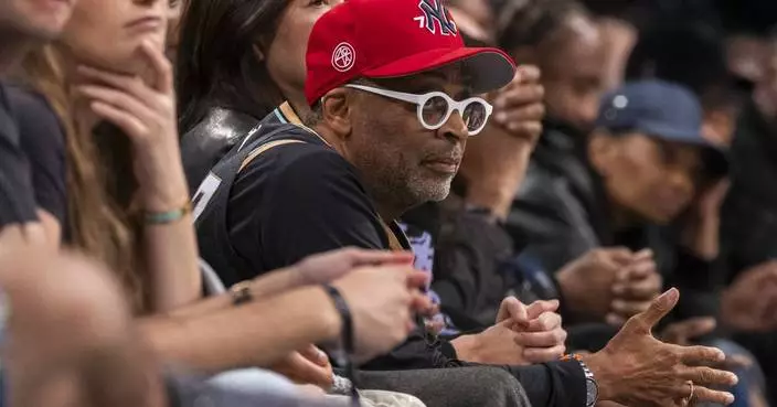 Basketball super fan Spike Lee takes in Liberty playoff game donning a Sabrina Ionescu jersey