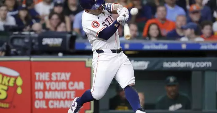 Astros' Jose Altuve 'not worried' after leaving game vs. Athletics with right side discomfort