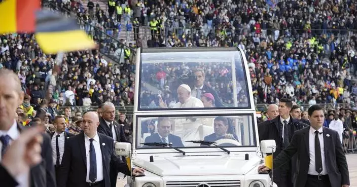 Pope wraps troubled visit to Belgium by beatifying 17th century mystic during sunny stadium Mass