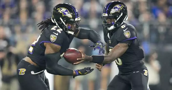 Henry runs for 199 yards and Jackson has 3 TDs as Ravens rout previously unbeaten Bills 35-10