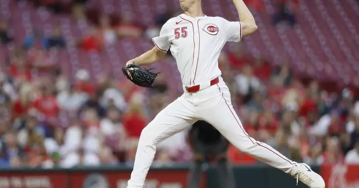 Reds pitcher Brandon Williamson departs in the 2nd inning with strained elbow